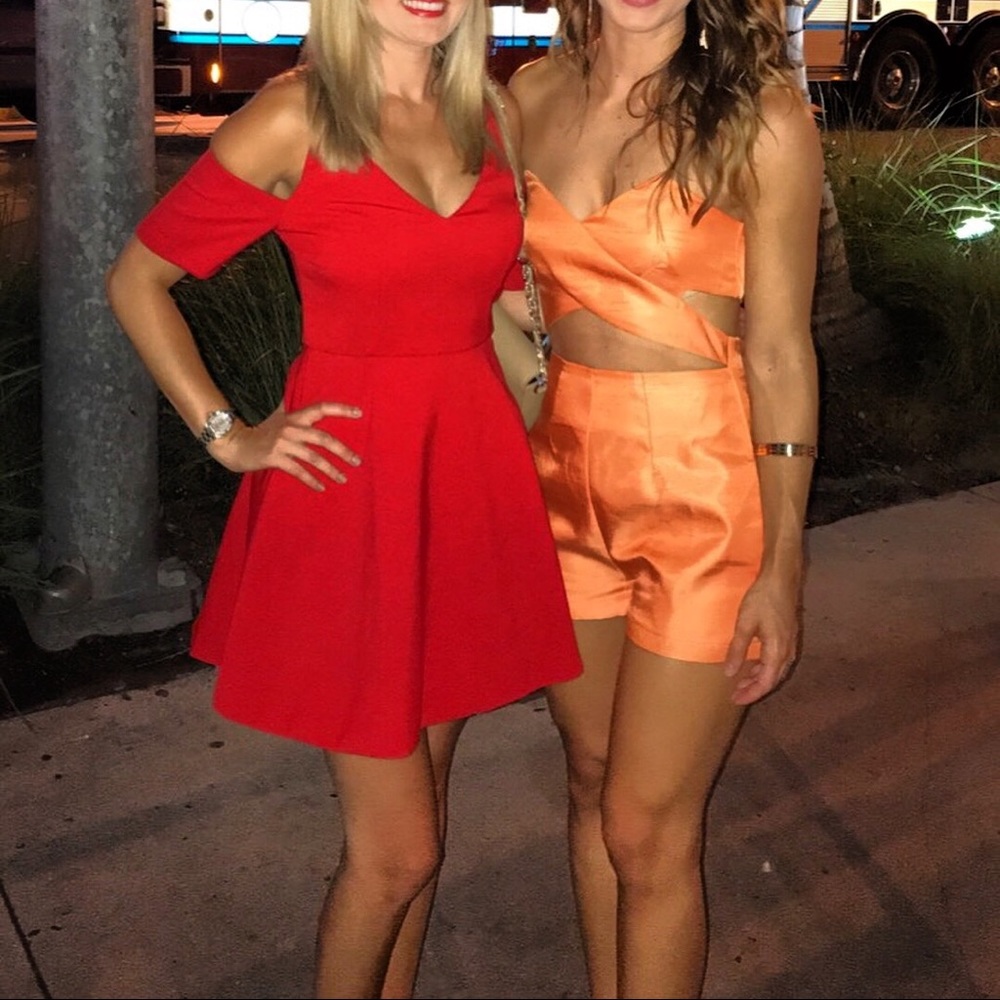 Orange romper, Size small. Worn only once!